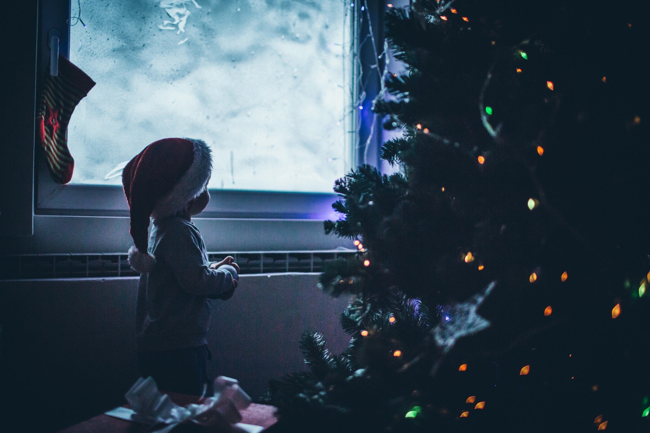 Happy Excited Toddler With Santa Hat Christmas