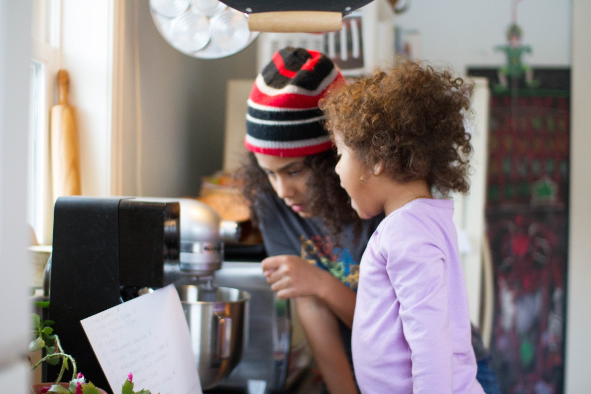 mother and daughter getting ready to bake