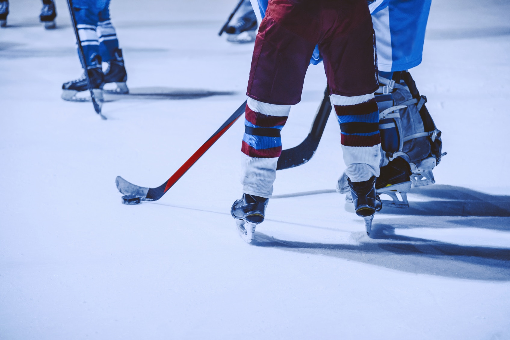 playing ice hockey