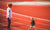 yong mother and little daughter standing in running court