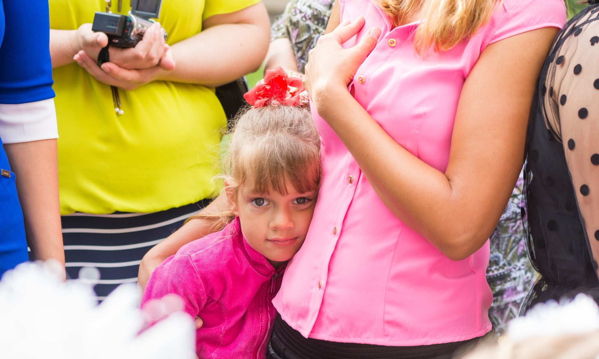 A child huging her mother