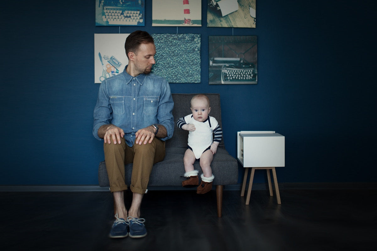 A person sitting with a child