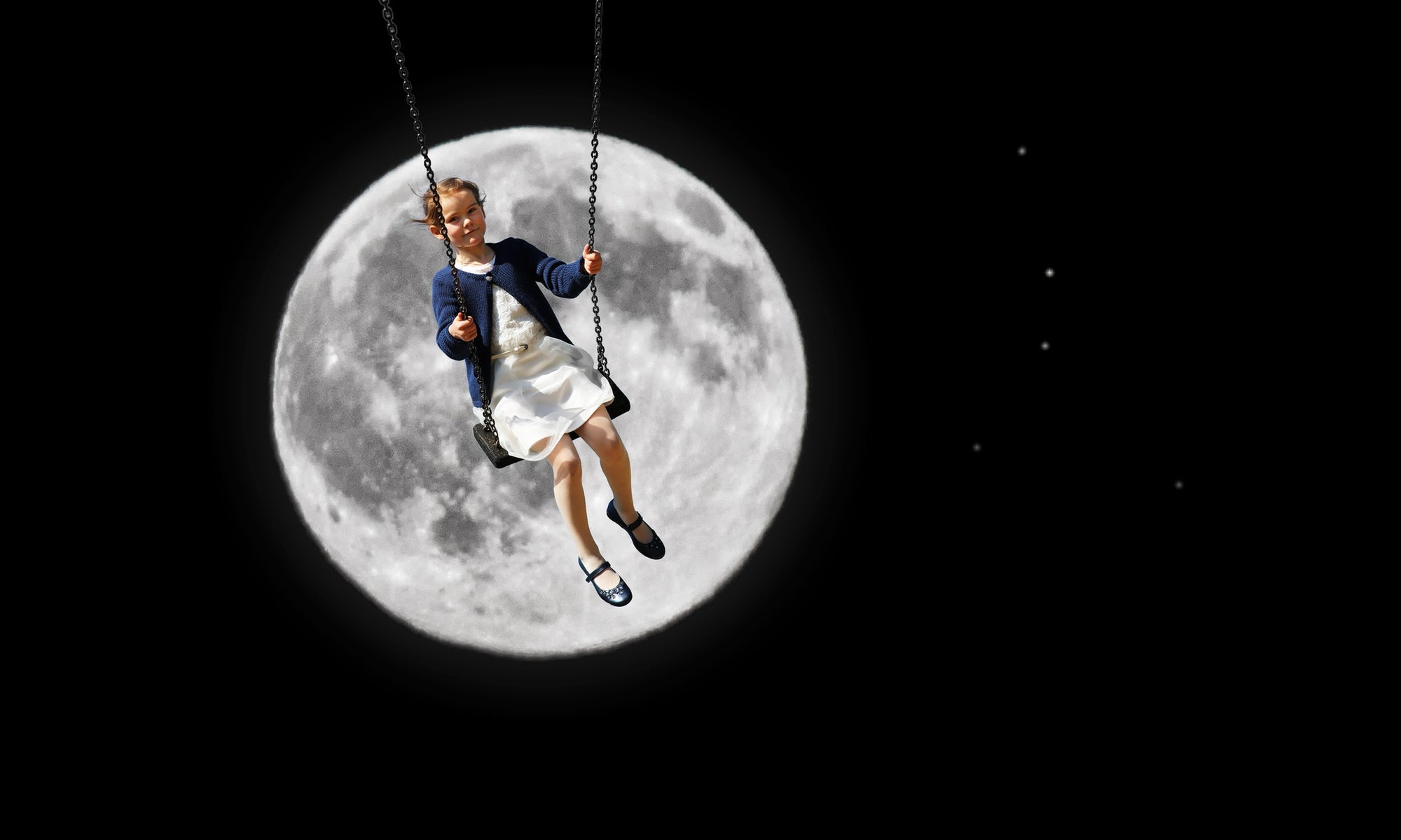 Girl on swing with moon on background