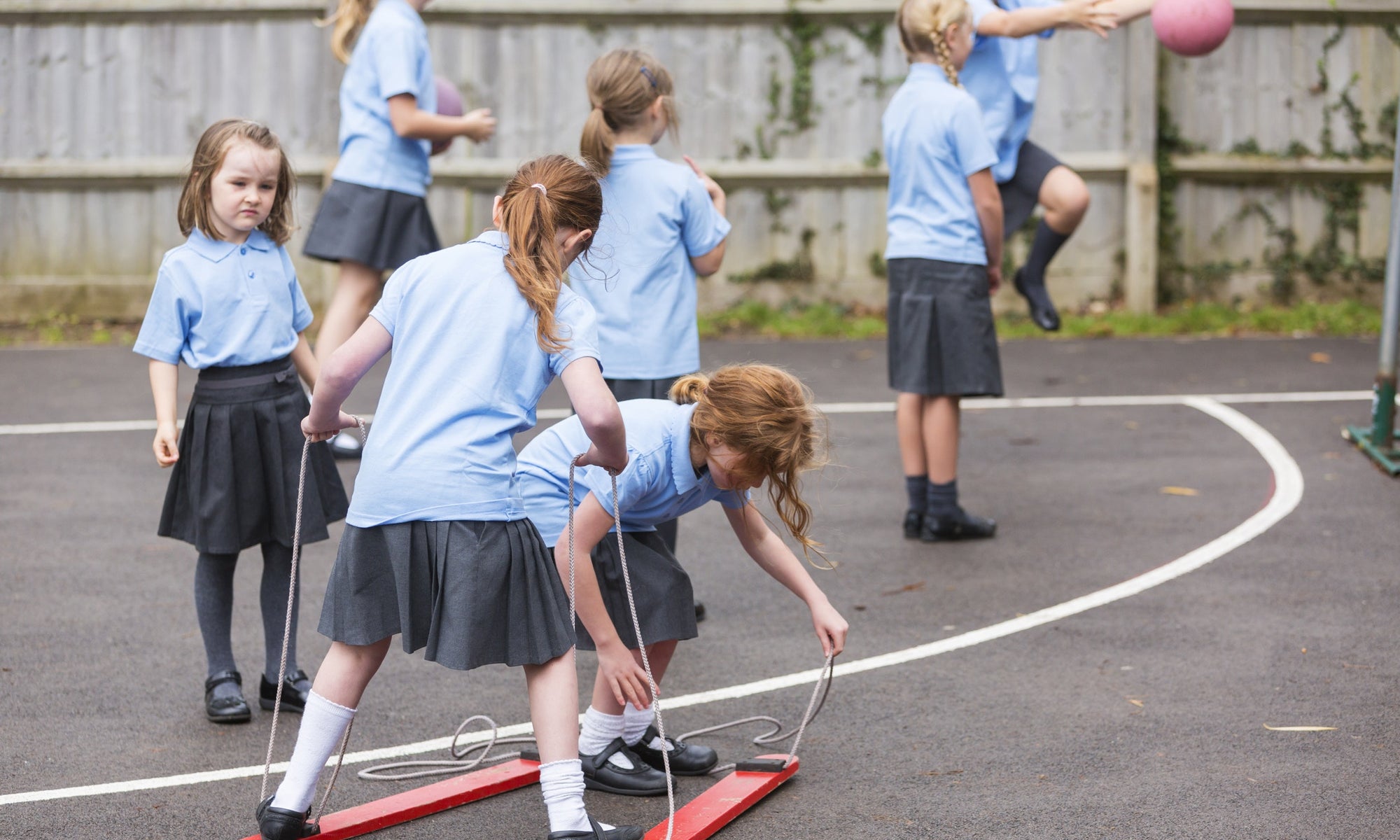 Children playing games in school