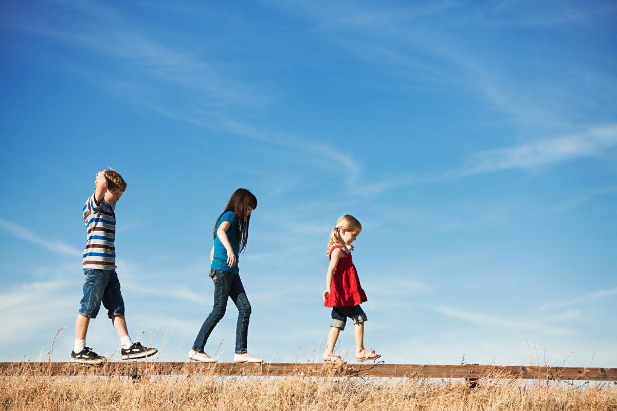 Kids walking on a track