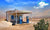 Retro Style Scene of old gas station in Desert