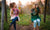 Two girls sitting on swing chair and talking