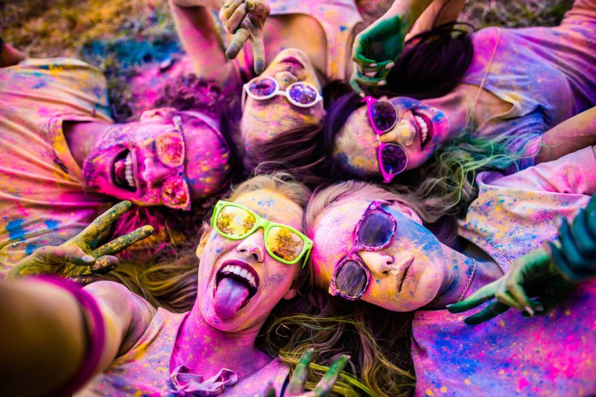 Group of girls playing with colours