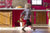 blurry little boy walking in kitchen