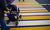 man crosses on zebra crossing with the stroller