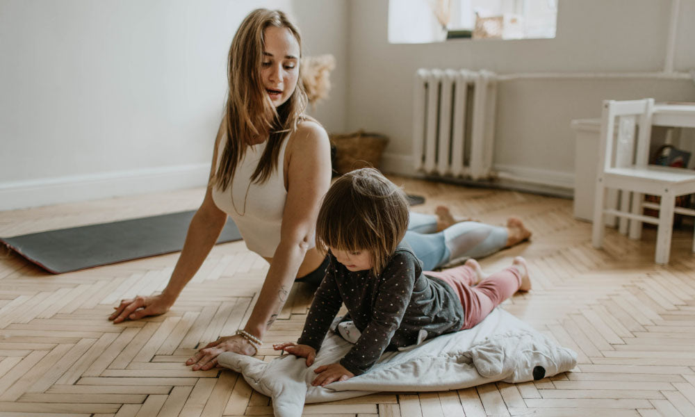 older and younger sister working out